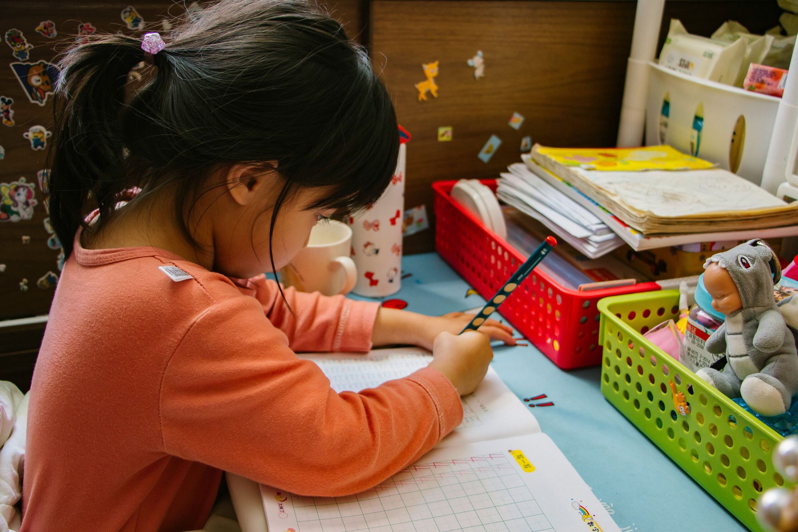 Child practicing writing numbers